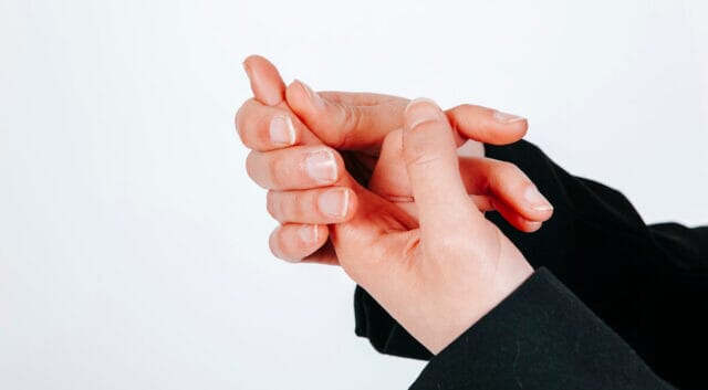 Female With Pain Finger
